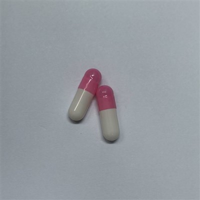 Розови и бели желатинови капсули